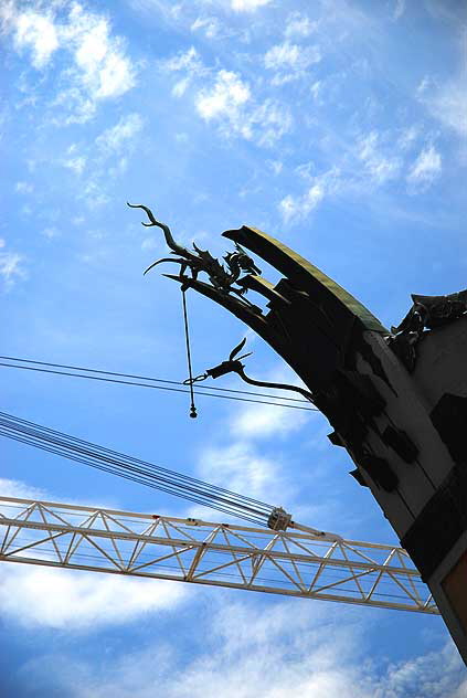 Above, the dragons of the famous Chinese Theater 