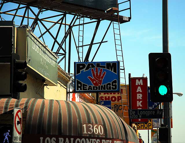 The local milieu on Vine - a palm reader, a Peruvian restaurant, someone sprayed the word "riot" on the wall.  Paul De Longpre (1855-1911) was the famous French painter - he did flowers,  He ended up in Hollywood.  His old mansion on Hollywood Boulevard was torn down long ago.  They named a street after him.