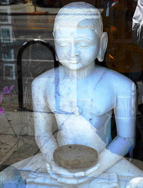 Buddha under glass - shop window on Sunset Boulevard, Hollywood