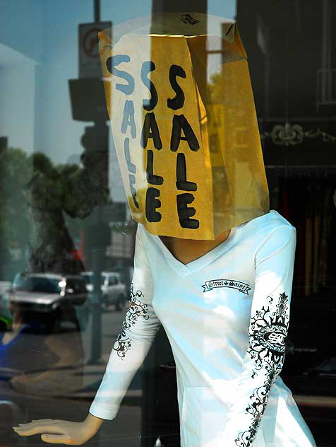 Manikin with bag on head - shop window, Melrose Avenue