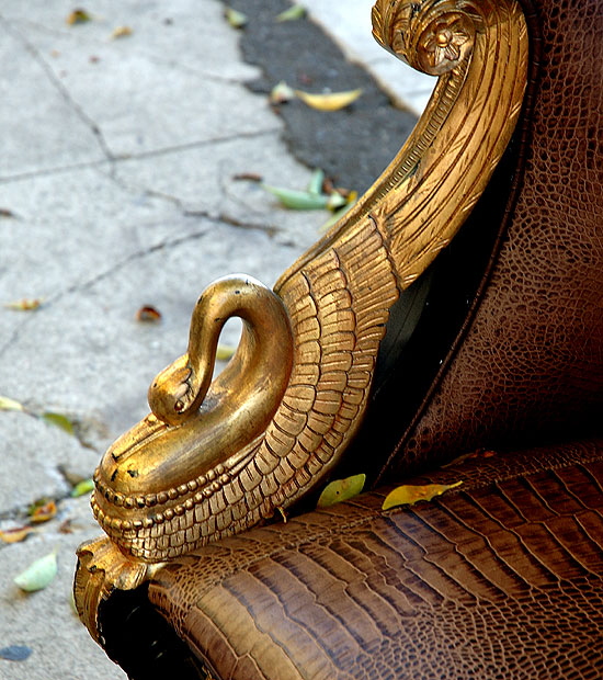 Another bird  a chair for sale on the sidewalk in the antiques district, La Brea at Wilshire.