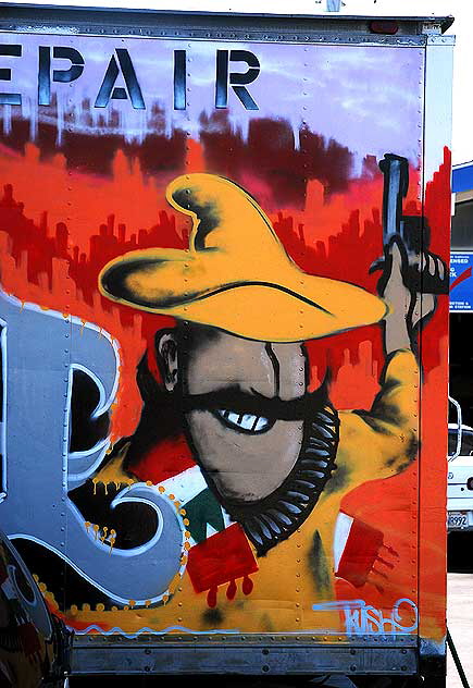 Man with gun - painted repair truck, West Los Angeles