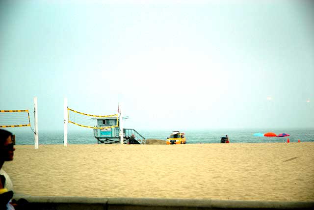 Hermosa Beach reflected in a mirrored window wall