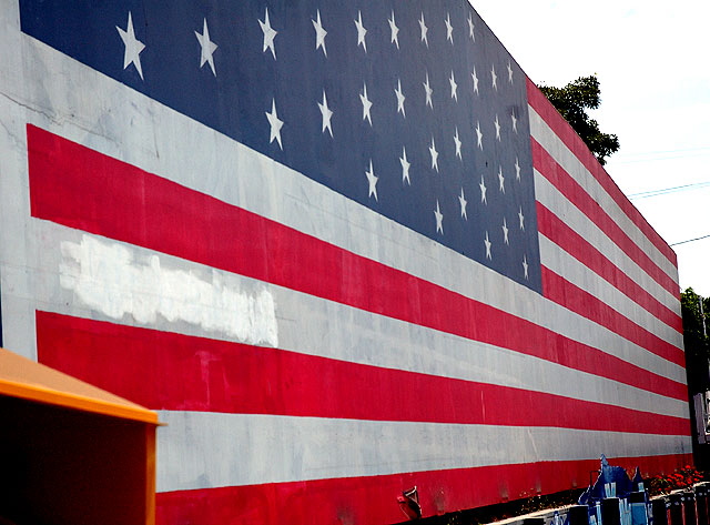 Flag wall at the Union 76 service station, northeast corner of Laurel Avenue and Sunset Boulevard 