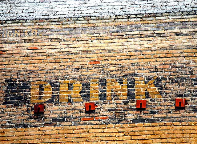 Old brick wall at Western and Third, Los Angeles - "Drink"