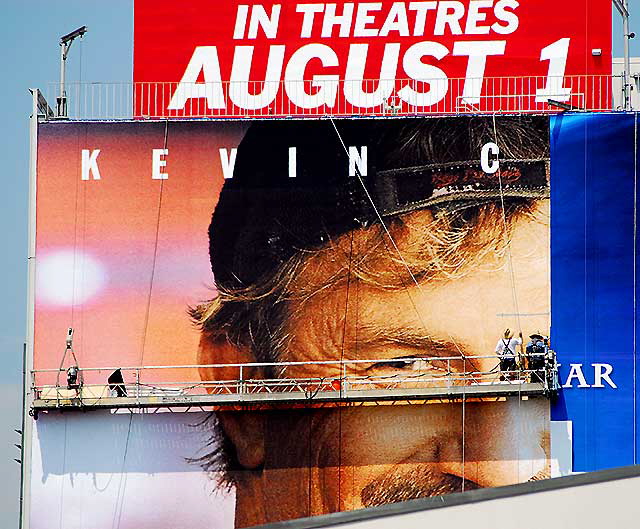 Kevin Costner building-wrap being installed on Sunset Boulevard, Tuesday, July 8, 2008