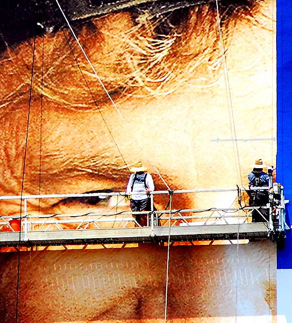 Kevin Costner building-wrap being installed on Sunset Boulevard, Tuesday, July 8, 2008