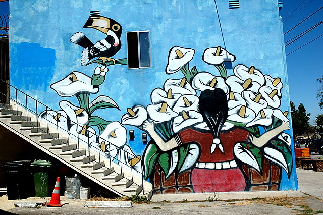 A mural of longing in Venice, California  way inland, on the northeast corner of Venice Boulevard and Cattaraugus. 