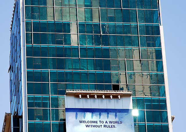 Promo for "The Dark Knight" on glass wall, Sunset and Vine, Hollywood - "Welcome to a World without Rules"