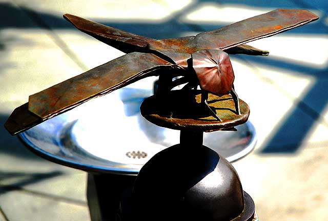 Metal dragonfly on the Santa Monica water fountain