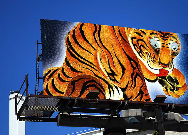 Tiger Billboard, advertisement for a new show of Japanese art at the county museum, above the "99-Cents Only" at Fairfax and Wilshire Boulevard, Los Angeles 