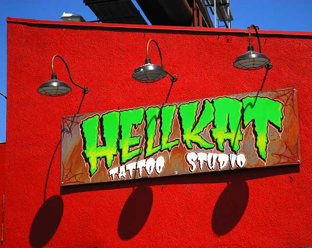 On the east side of Barris Kustom Industries, Hellkat Tattoos