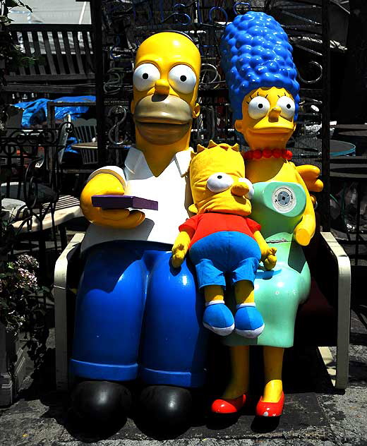 Simpsons - sculptures at the curio shop and Hollywood prop house at the corner of La Brea and 1st - Nick Metropolis