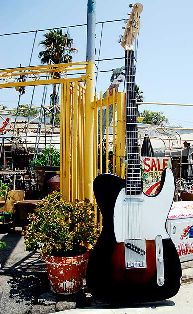 Giant Fender guitar at the curio shop and Hollywood prop house at the corner of La Brea and 1st - Nick Metropolis