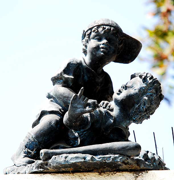 Small bronze on a wall in Santa Monica, on Sixth Street