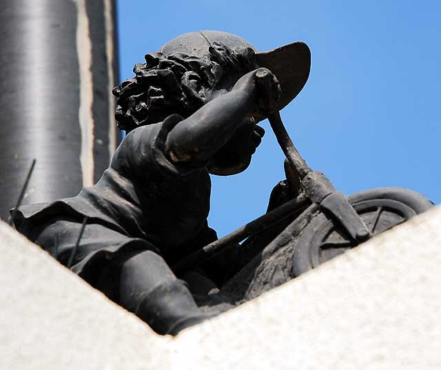 Small bronze on a wall in Santa Monica, on Sixth Street