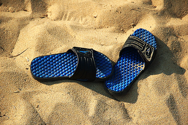 Sandals in sand, Cape Cod
