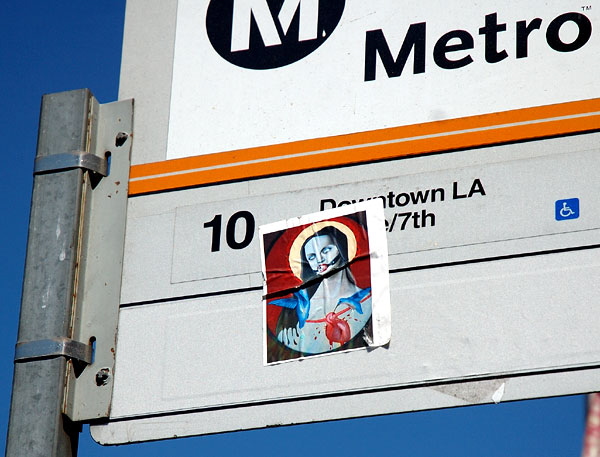 Sticker at bus stop, Melrose Avenue