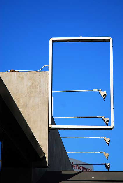 Empty sign frame and lamps, West Pico Boulevard, Los Angeles