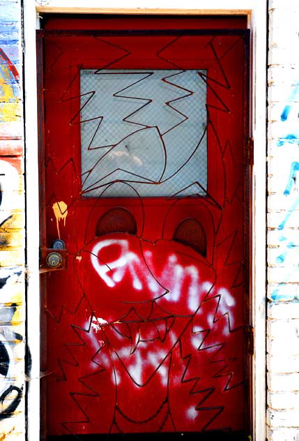 "Face Door" in a back alley off Albert Kinney Boulevard, Venice, California