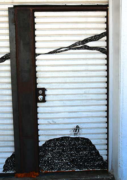 2007 Ann Tusi mural on rollup door - off Main Street in Venice Beach