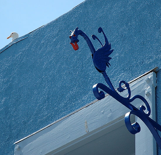 Blue wrought iron dragon with gull, Oceanfront Walk, Venice Beach 