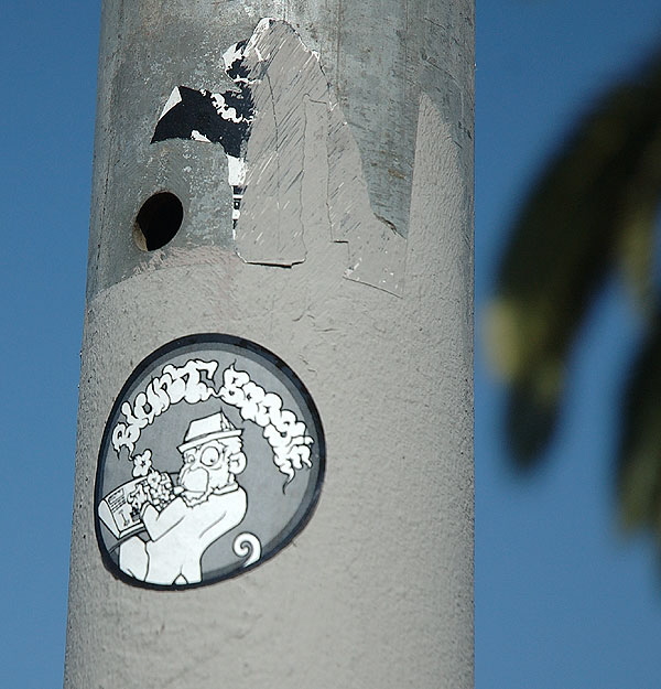 White sticker on pole, Sunset Boulevard