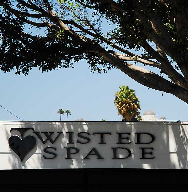 Twisted Spade, at 5161 Hollywood Boulevard, with the Griffith Park Observatory in the background