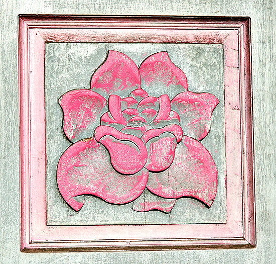 Wood rose facing the late sun, a beauty shop door, Cahuenga and Hollywood