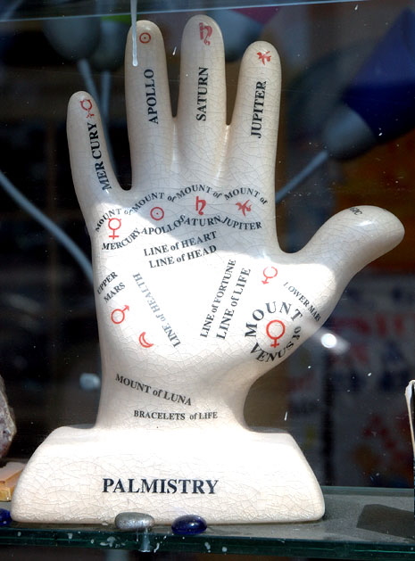 Stone palmistry guide in the window - West Hollywood psychic