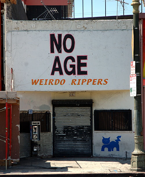 The manufactured picturesque at 247 South Main Street, LOs Angeles, between 2nd and 3rd – a storefront modified to promote a new album by the LA lo-fi noise/punk duo, No Age, which would be Randy Randall and Dean Spunt.  The album is Weirdo Rippers.