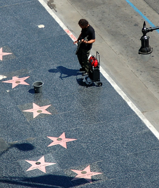 The lonely and quite awful guitarist on the Hollywood Walk of Fame at the Kodak Theater