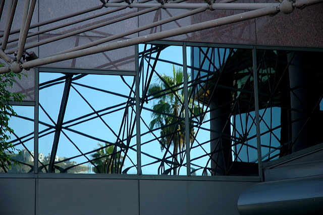 The Hollywood Hills, where the directors and cinematographers and celebrities live, framed by the framing at the entrance to the Director Guild of America headquarters on Sunset Boulevard at Harper
