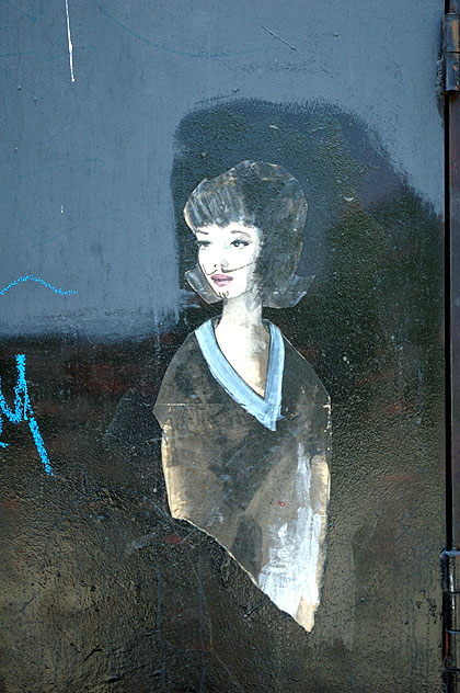 Graphic in alley at 6825 Melrose Avenue (at Orange Drive), Los Angeles