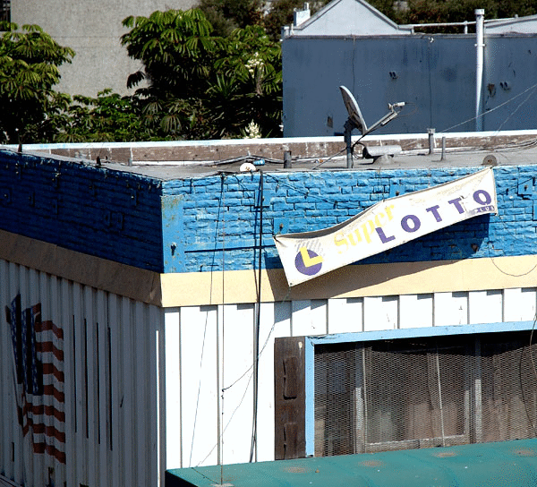 Faded lotto sign under the Santa Monica Pier