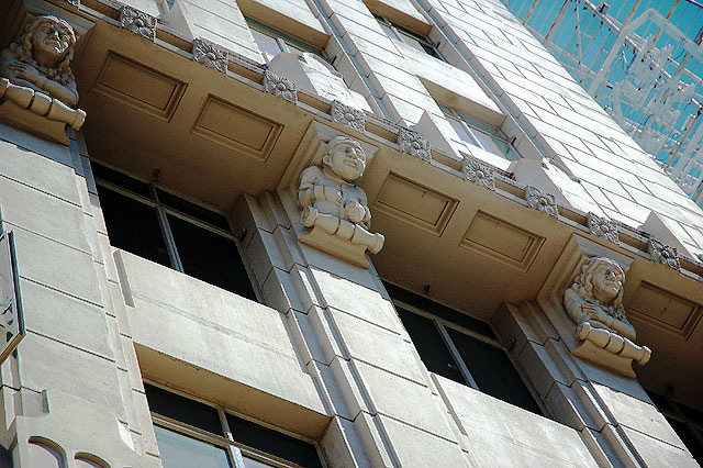Stone faces at the Equitable Building, Hollywood and Vine  1929, Alexander Curlett, architect