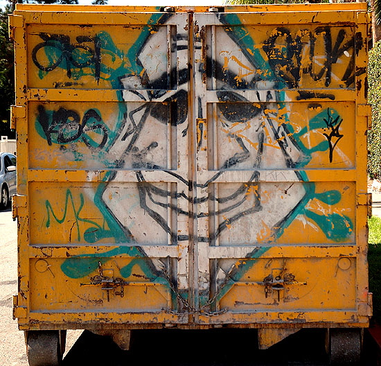 Face on trash container behind the Roosevelt Hotel , Hollywood