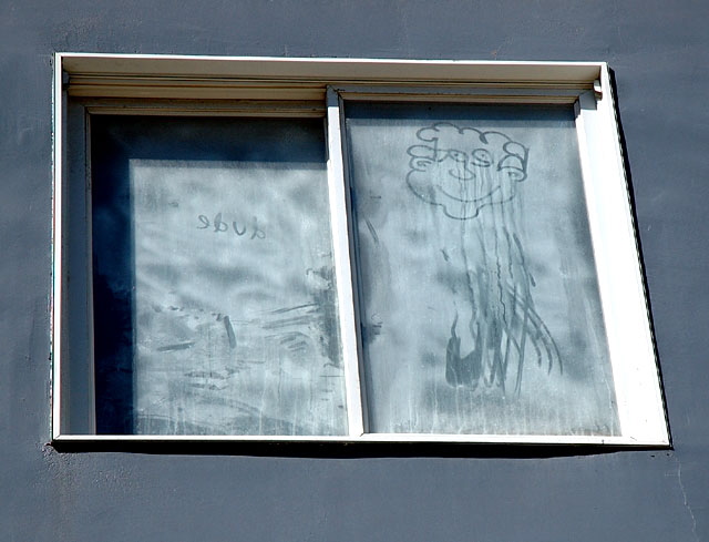 Marked up window in the Marina Peninsula, just east of Venice Beach 