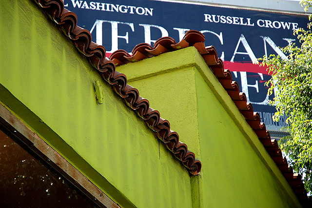 Green stucco, red tile, Hollywood billboard, Melrose Avenue