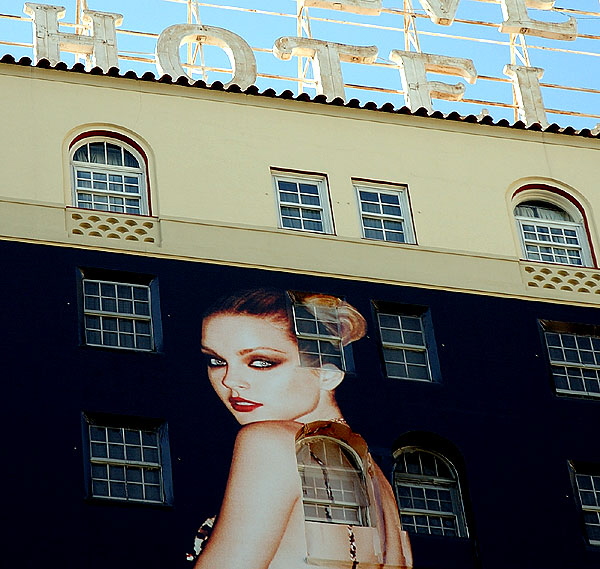 Woman on the side of the Roosevelt Hotel, Hollywood Boulevard