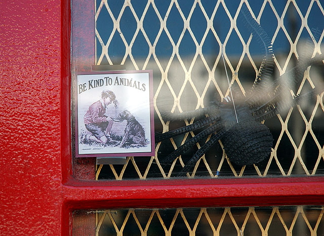 A message in the window of a curiosity shop, Sunset Boulevard, West Hollywood: Be Kind to Animals