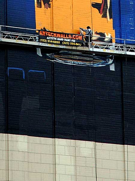 Painting the east wall of the Equitable Building at the Pantages - Hollywood