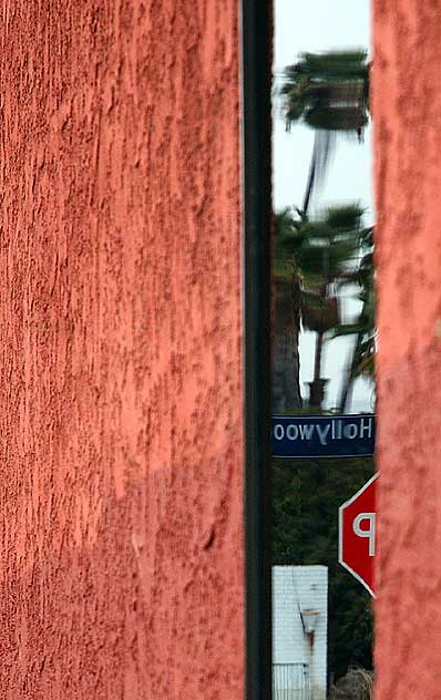 Reverse view of Hollywood in mirror glass, Hollywood Boulevard at El Centro 