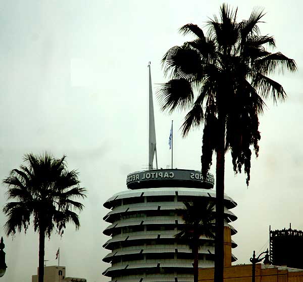 Reverse view of Hollywood in mirror glass, Hollywood Boulevard at El Centro 