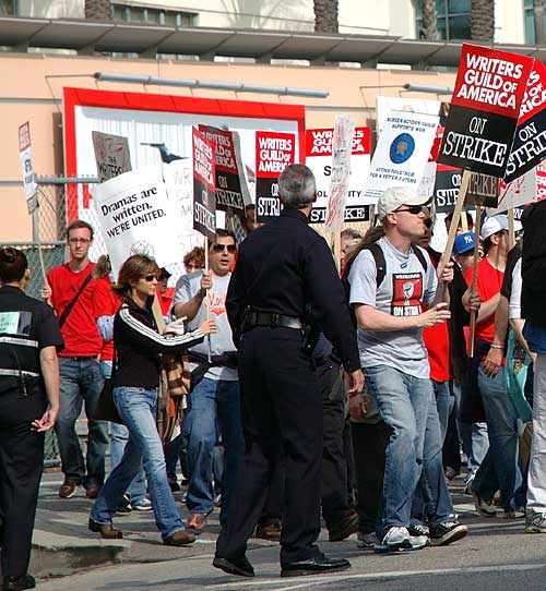 Thousands of Hollywood screenwriters on strike against film and TV studios rallied outside 20th Century Fox on Friday in their biggest collective show of force yet as pressure mounted on both sides to resume contract talks - Friday, November 9, 2007