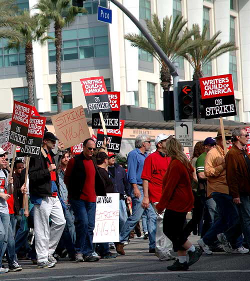 Thousands of Hollywood screenwriters on strike against film and TV studios rallied outside 20th Century Fox on Friday in their biggest collective show of force yet as pressure mounted on both sides to resume contract talks - Friday, November 9, 2007