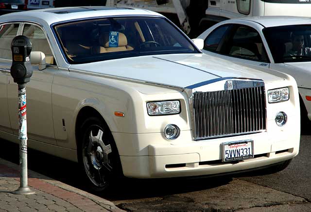 New white Rolls Royce parked at the Guitar Center, Guitar Row, Sunset Boulevard, Hollywood