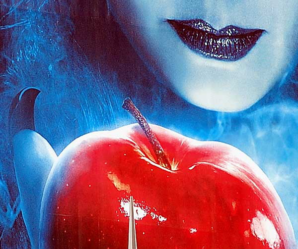 Building-sized "Enchanted" promo at Sunset Plaza - detail: blue lips and red apple