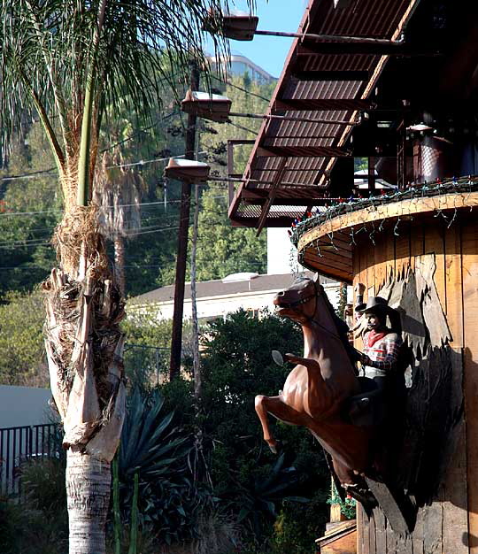 The cowboy on the side of the Saddle Ranch Steakhouse on the Sunset Strip