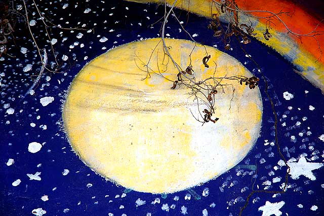 A moon on a mural at the entrance to Elysian Park